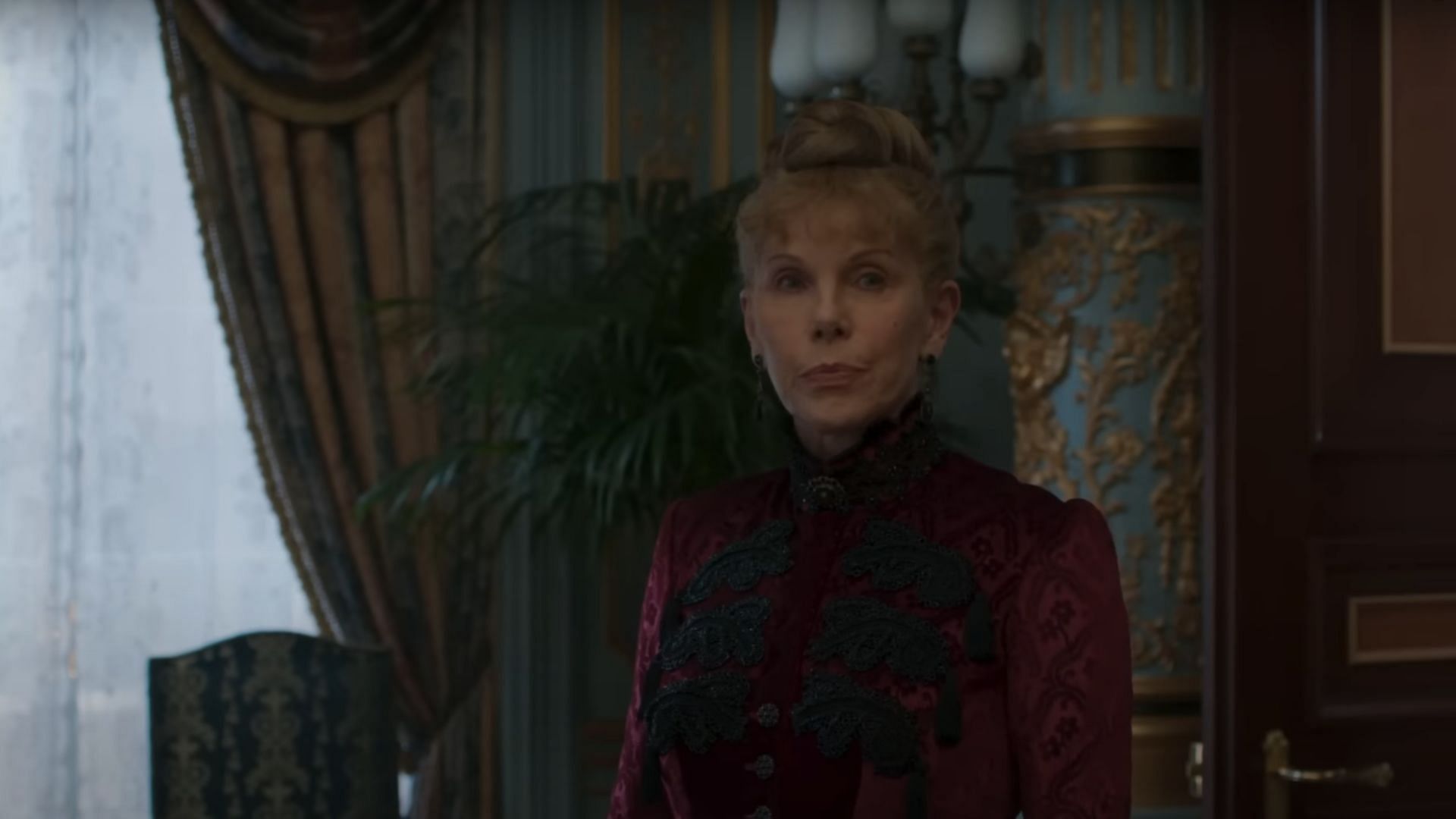 Agnes has a stern sense of fashion (Image via YouTube/HBO)